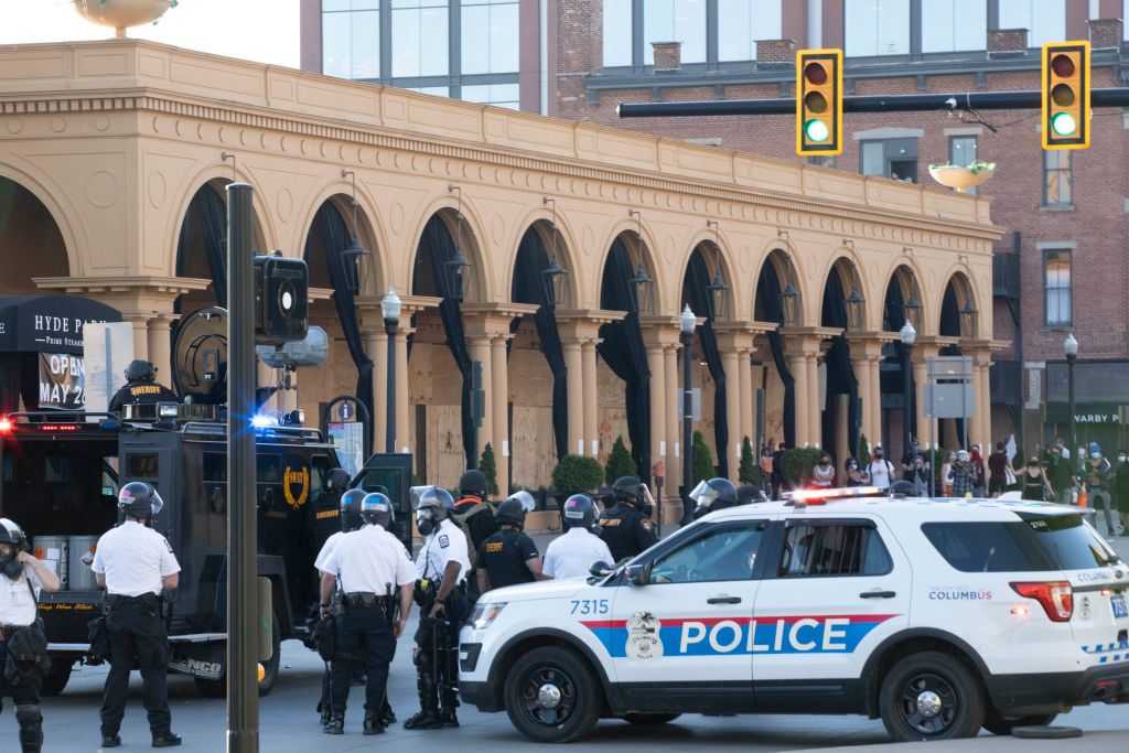 Columbus Police stand alert at the intersection of Goodale...