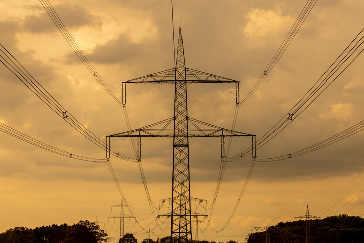 Electricity pylons at sunset