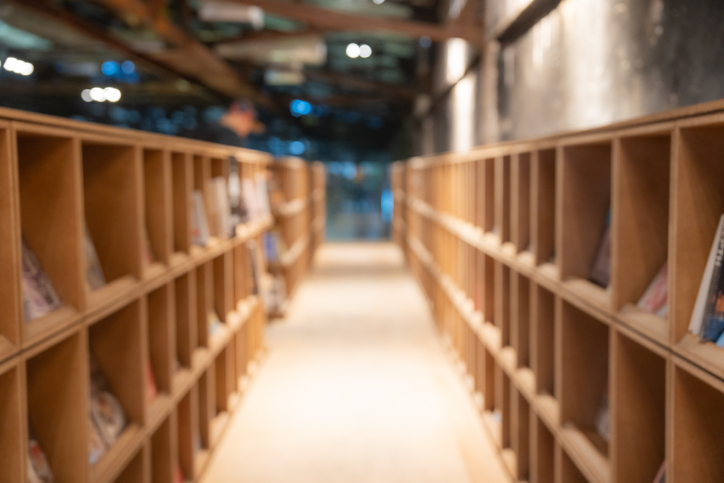 Abstract blur beautiful library bookshelf interior for backgrounds