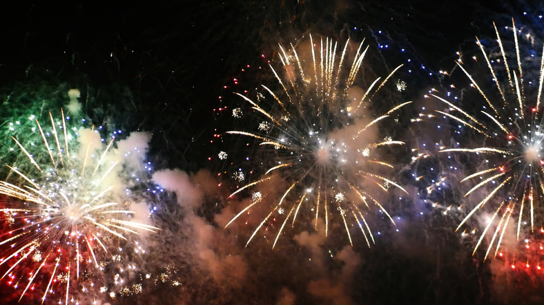 Firework celebrate anniversary happy new year 2024, 4th of july holiday festival. colorful firework in the night time to celebrate national holiday. countdown to new year 2025 party time event.