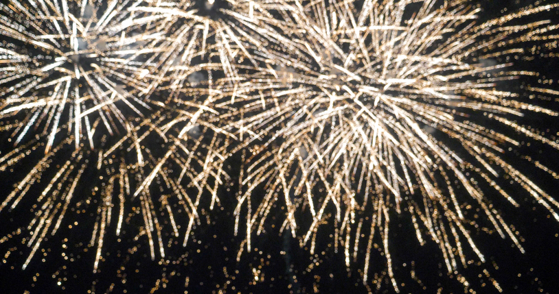 Blurred background Golden Firework celebrate anniversary happy new year 2025, 4th of july holiday festival. Blurry gold firework night time celebrate national holiday. Countdown to new year 2025 festival