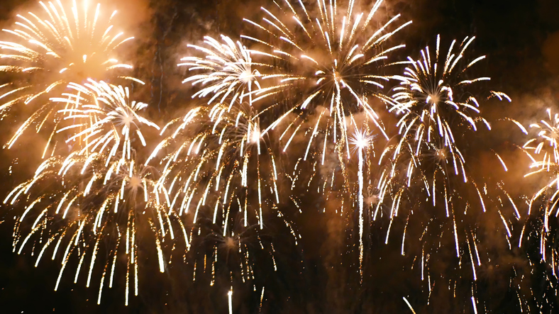 Golden Firework celebrate anniversary happy new year 2024, 4th of july holiday festival. Gold firework in the night time celebrate national holiday. Countdown to new year 2024 gold party time event
