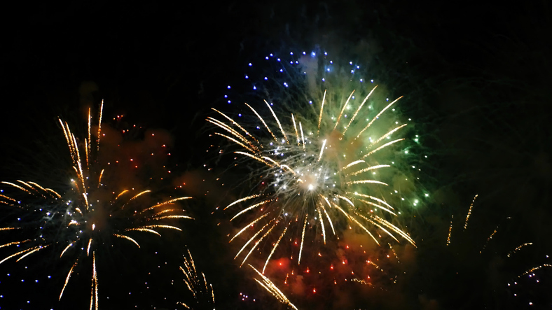 Firework celebrate anniversary happy new year 2024, 4th of july holiday festival. colorful firework in the night time to celebrate national holiday. countdown to new year 2025 party time event.