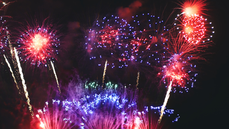 Purple Firework celebrate anniversary happy new year 2024, 4th of july holiday festival. Purple firework in night time celebrate national holiday. Violet firework Countdown to new year 2024 festival