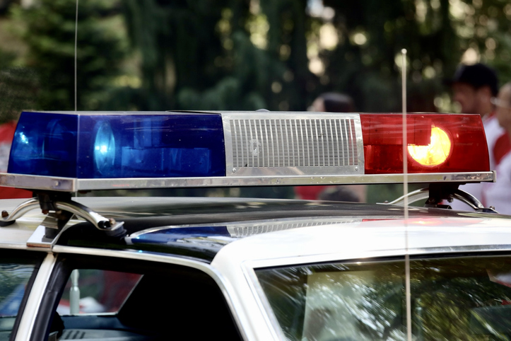 Police car light bar flashing red and blue