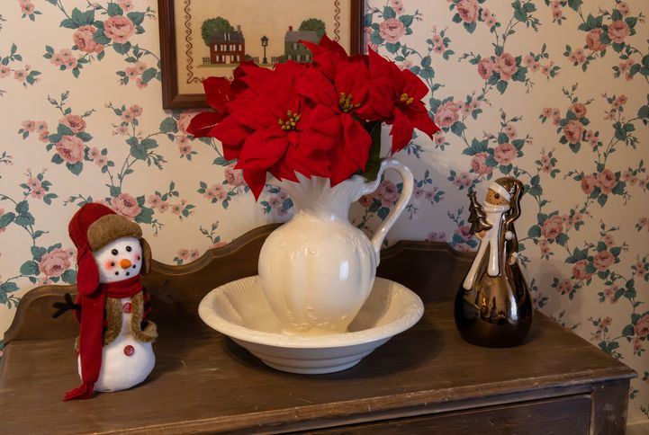 Wash bowl and pitcher with Christmas decorations