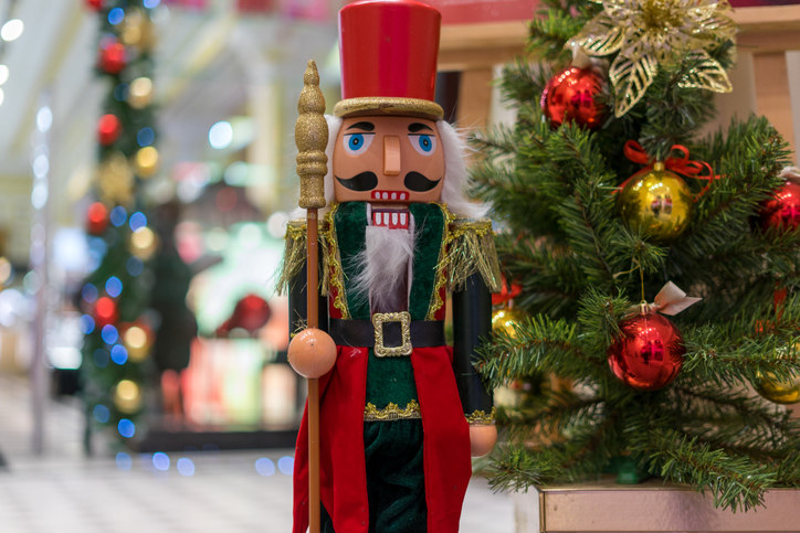 Nutcracker figure next to the Christmas tree