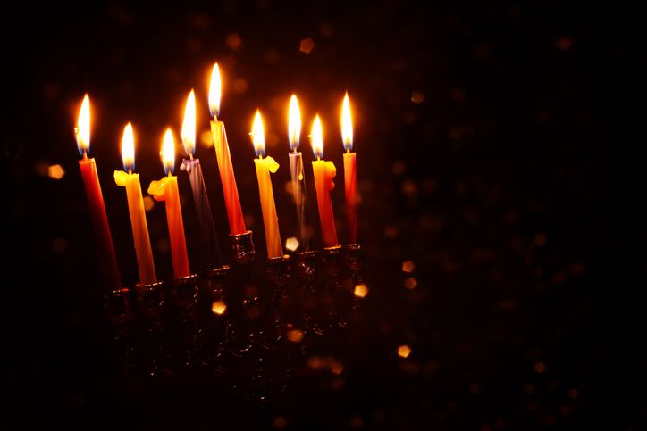 Religion image of jewish holiday Hanukkah background with menorah (traditional candelabra) and candles