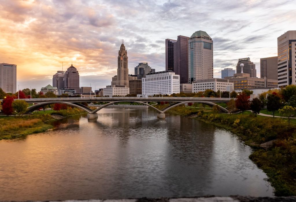 Scenic view of river by buildings against sky,Columbus,Ohio,United States,USA