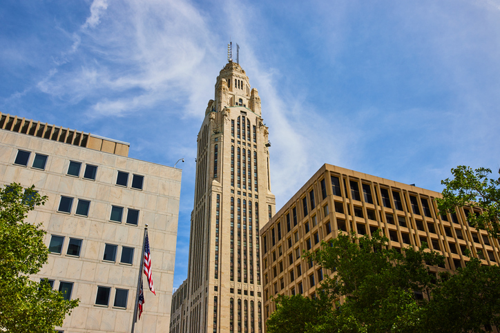 LeVeque Tower Columbus Ohio with American and Ohio flags on summer day