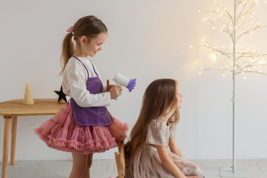 children playing hairdresser at home