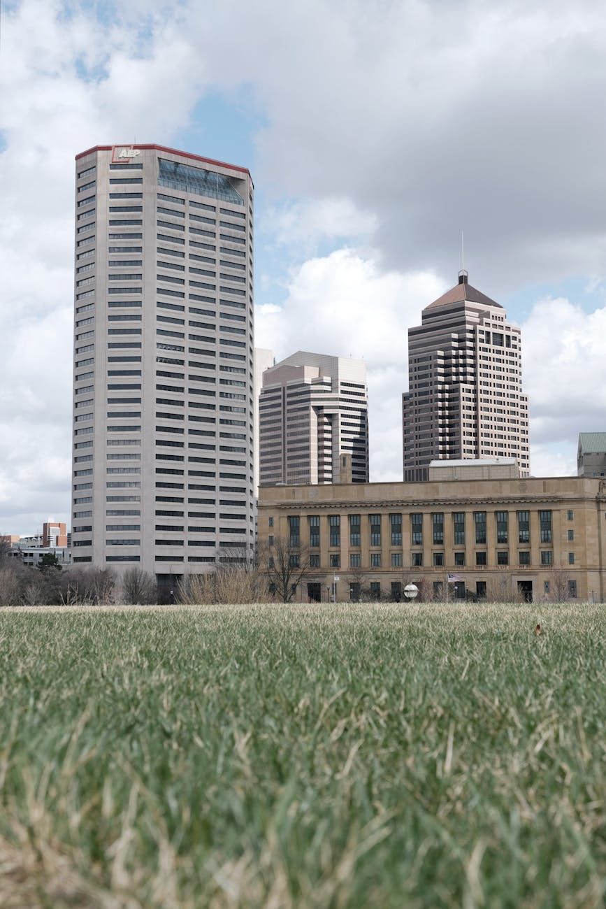 downtown columbus skyline with grass in foreground