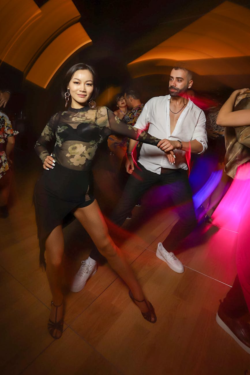 serene couple dancing in a nightclub