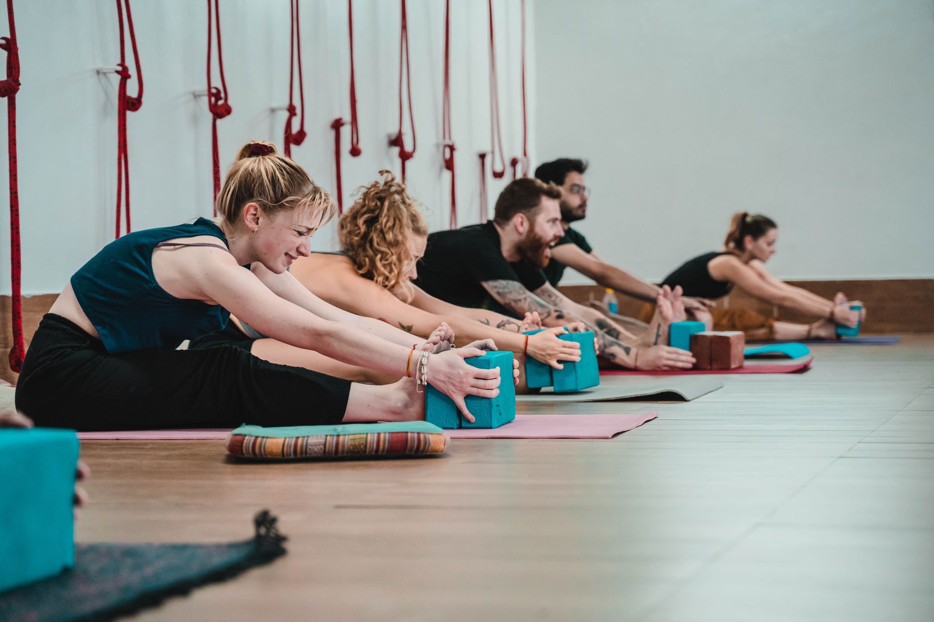 group stretching on mats