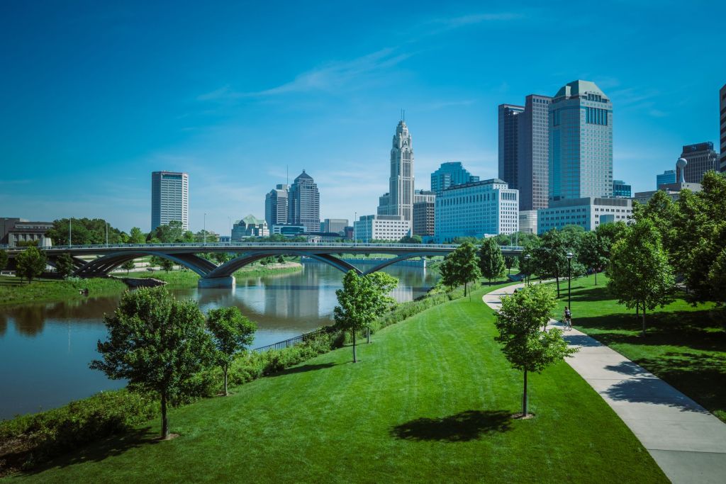 park and river near modern city downtown