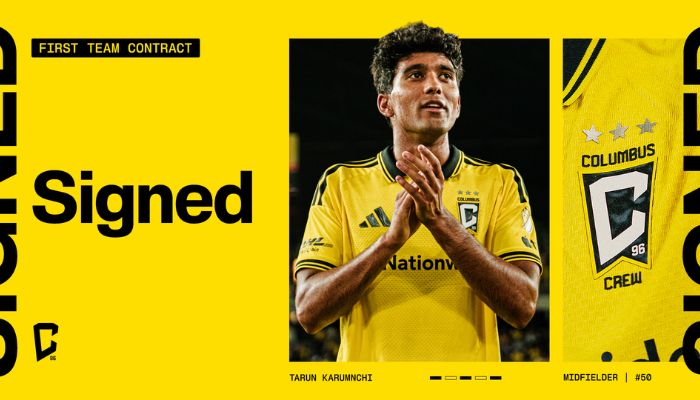 A soccer player in a yellow jersey with the text "Signed" and "Tarun Karnunchi" standing on a yellow background with the Columbus Crew logo.