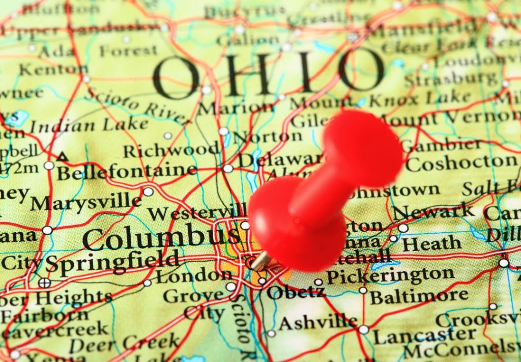 A map of Ohio and surrounding states, with a red thumbtack marking the city of Columbus.