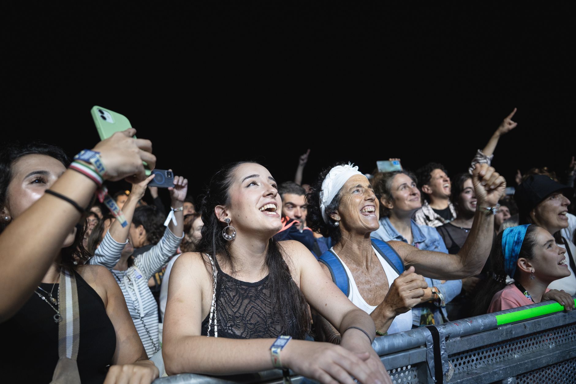 excited concert crowd enjoying live performance